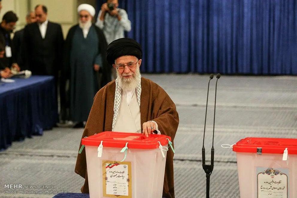 Iran's ruler Ali Khamenei casting his vote in the 2017 presidential election