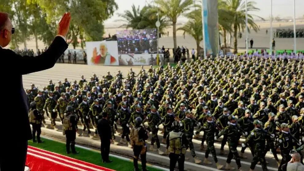 Iraqi Prime Minister Mustafa al-Kadhimi during a military parade by Iran-backed Shiite militia Hashd al-Shaabi, in the town of al-Khalis, Diyala province, eastern Iraq, on July 23, 2022