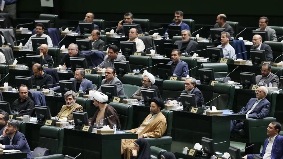 Iranian lawmakers listening to President Masoud Pezeshkian defending his cabinet on August 21, 2024 