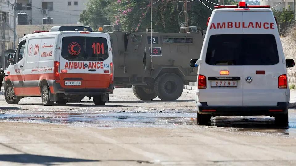 Ambulances respond, as an Israeli military vehicle takes part in a raid, in Jenin, in the West Bank, August 28, 2024.