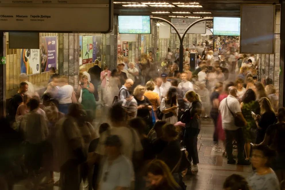 People take cover inside a metro station during a Russian missile and drone strike, amid Russia's attack on Ukraine, in Kyiv, Ukraine August 26, 2024. 