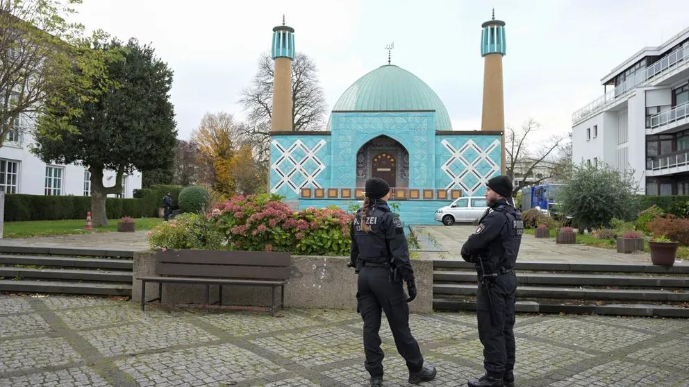 German police stand outside during an Islamic Center Hamburg raid, due to suspicion of members acting against a constitutional order and supporting the militant group Hezbollah in Hamburg, Germany, November 16, 2023.