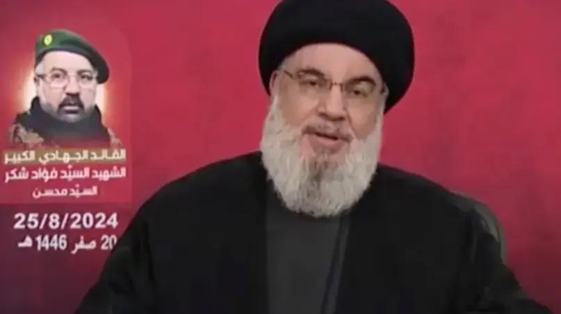 Hezbollah leader Hassan Nasrallah speaks in a televised address after Israel and Hezbollah exchanged heavy fire [Handout/Al-Manar TV via Reuters]